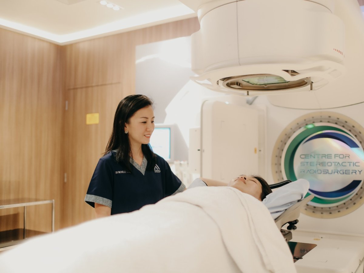 Preparing the patient for the staging CT planning scan at the Centre for Stereotactic Radiosurgery.
